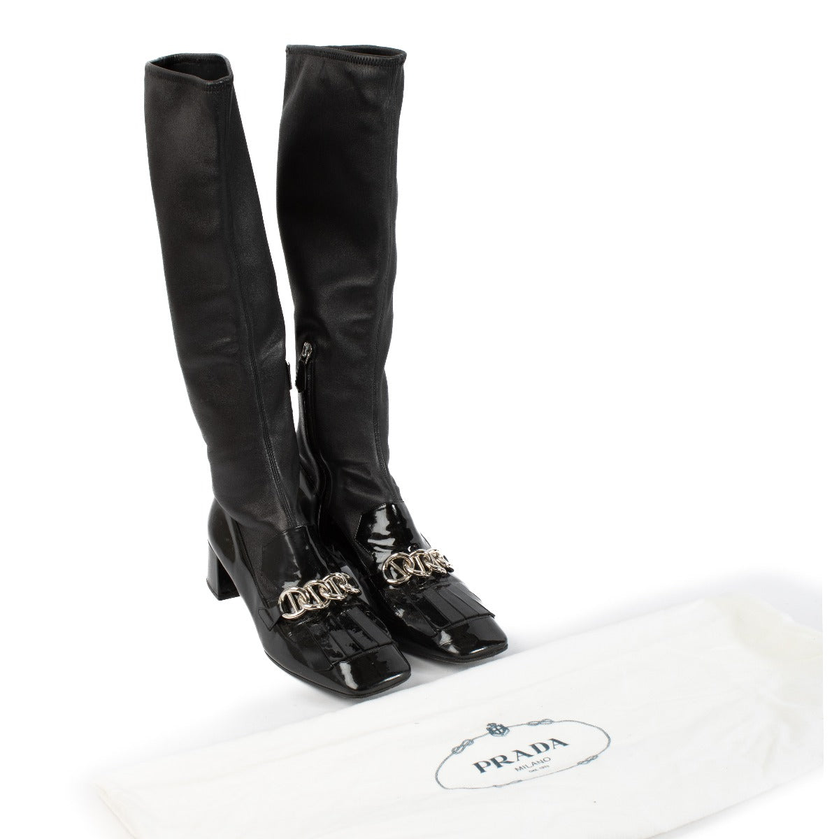 Prada knee-high boots in size 41, crafted from elastic leather. Stylish and timeless. Shop at Labellov.