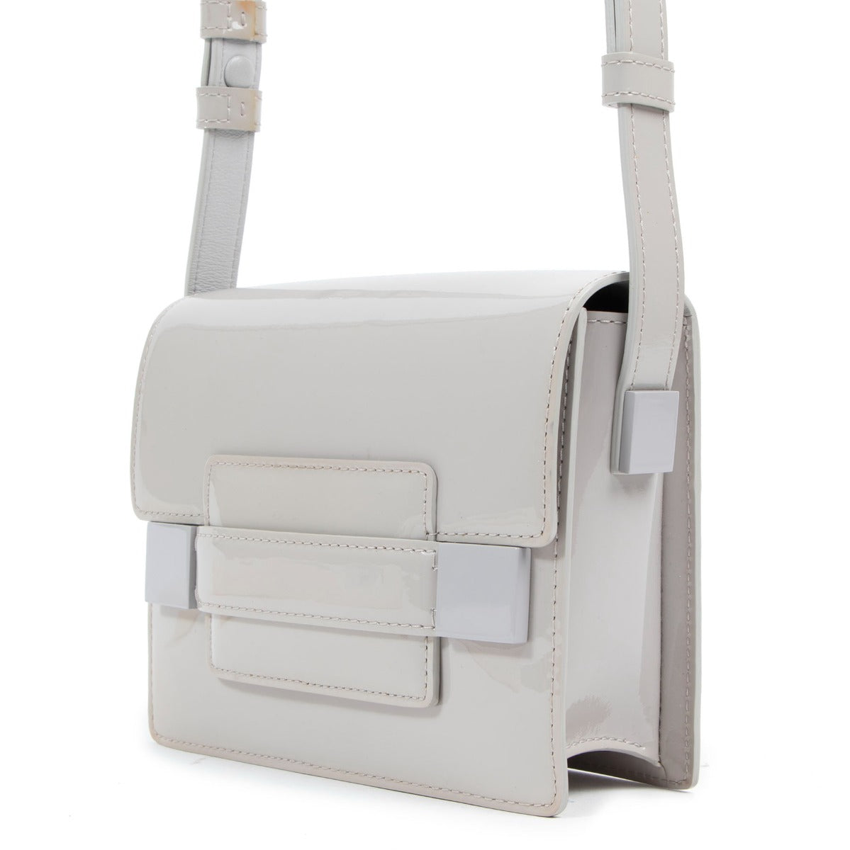 Buy an authentic second-hand Delvaux Beige Patent Leather Madame Mini Shoulder Bag in very good condition at Labellov Antwerp.