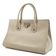 Shop safe online at Labellov in Antwerp, Brussels and Knokke this 100% authentic second hand Jimmy Choo Beige Leather Riley Tote Bag