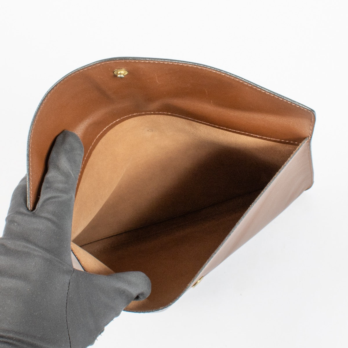 shop 100% authentic second hand Delvaux brown Clutch on Labellov.com