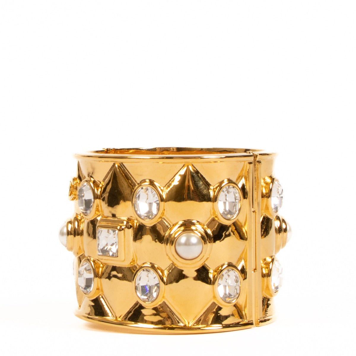 100% authentic Chanel cuff bracelet in gold-tone metal embellished with crystal and faux pearl on www.labellov.com