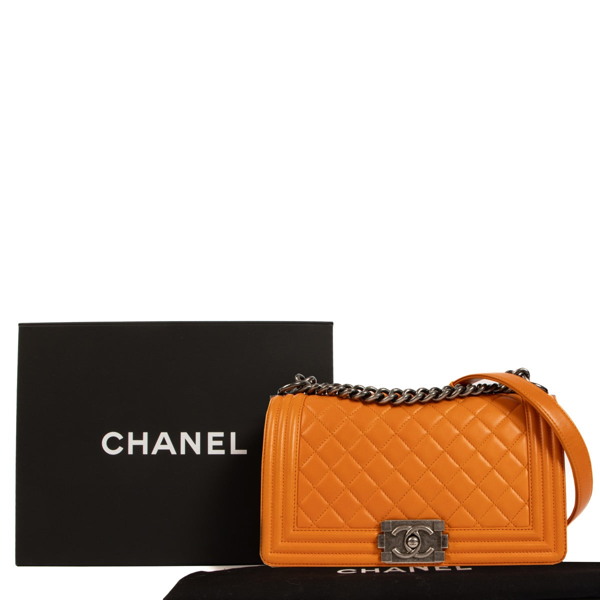 shop 100% authentic second hand Chanel Orange Calfskin Medium Boy Bag on Labellov.com