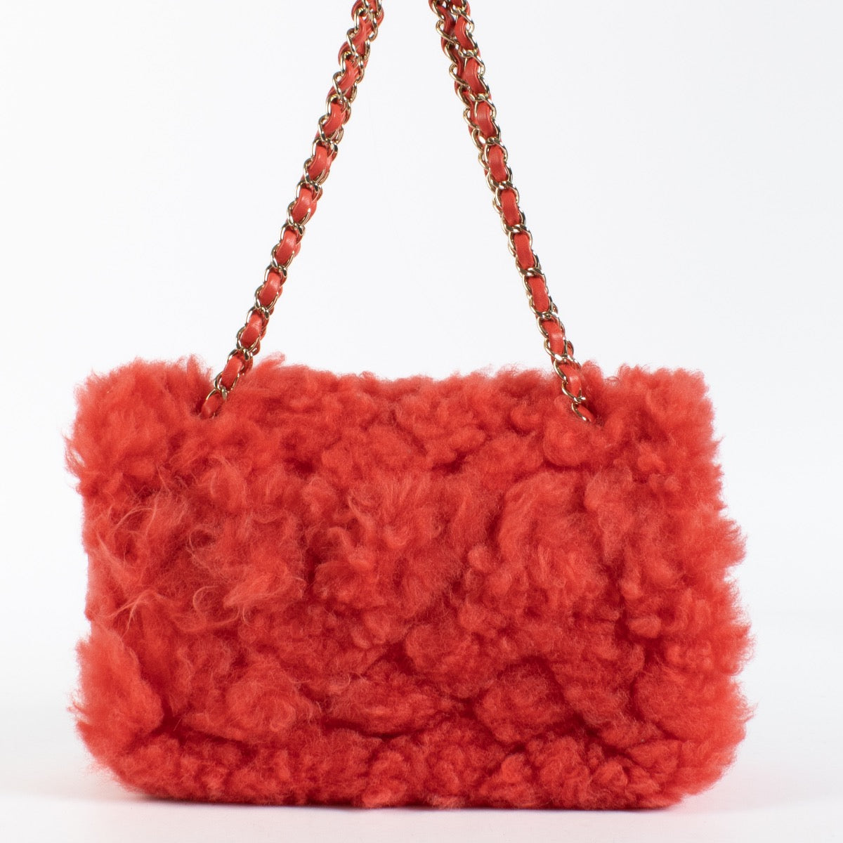 authentic preloved Chanel Red Shearling Classic Flap Bag on Labellov.com