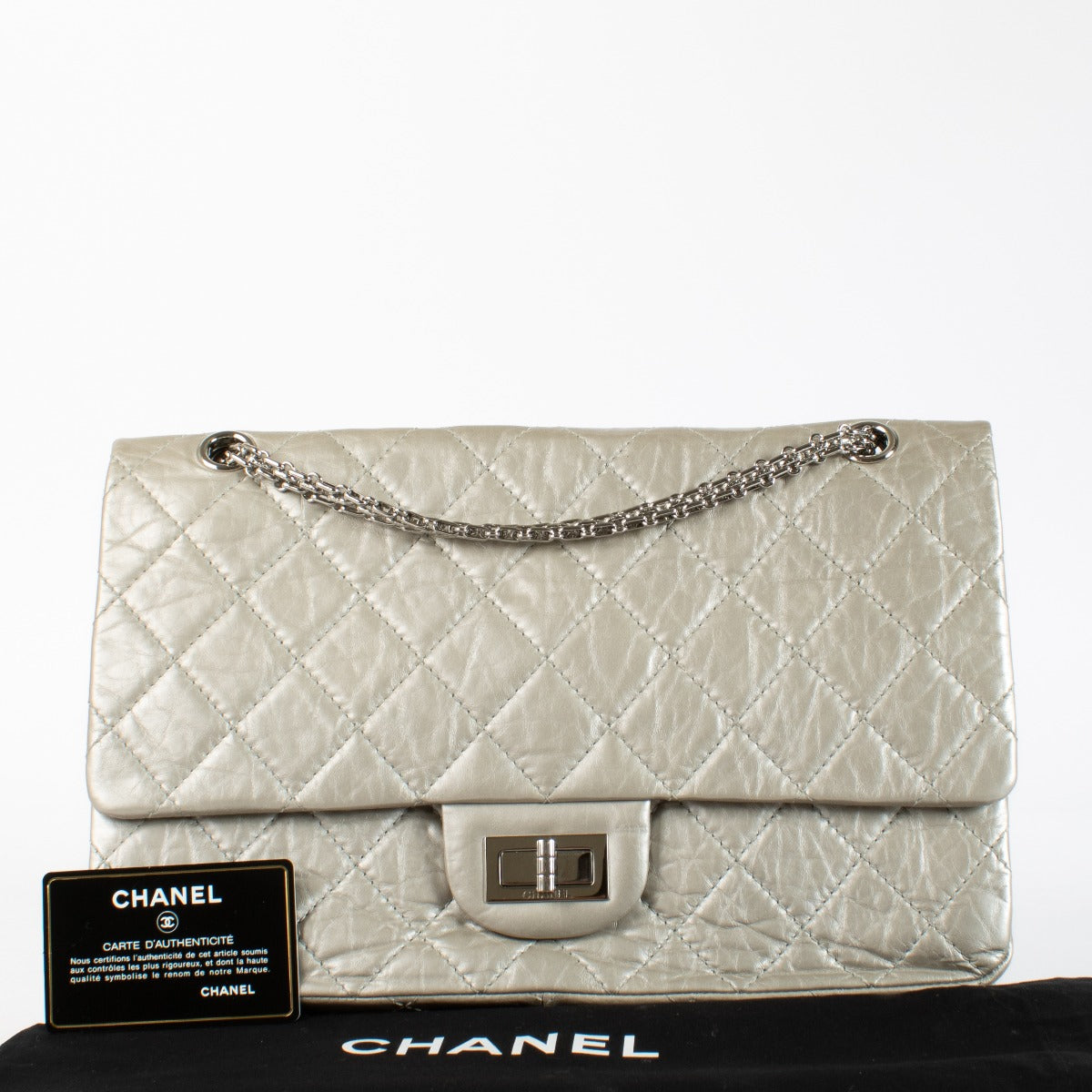 Authentic pre-loved Chanel Silver Maxi 2.55 Bag on Labellov.com