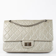 Authentic pre-loved Chanel Silver Maxi 2.55 Bag on Labellov.com
