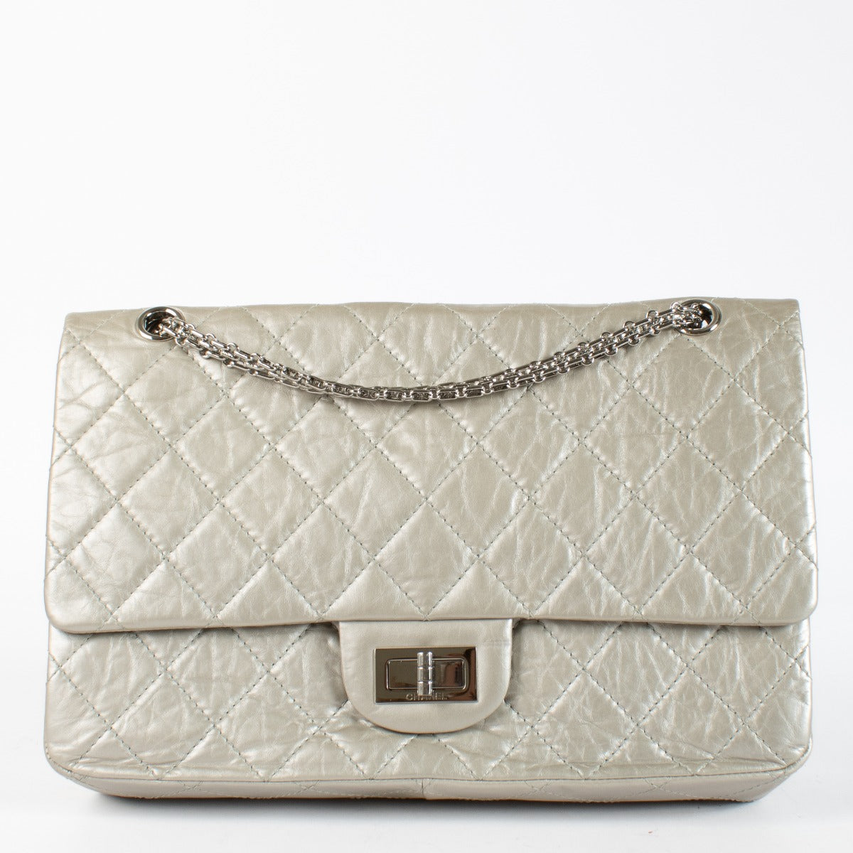 Authentic pre-loved Chanel Silver Maxi 2.55 Bag on Labellov.com
