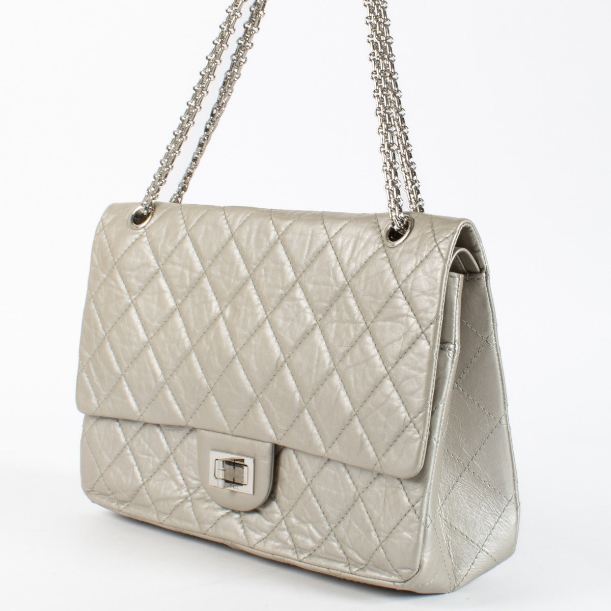 Authentic pre-loved Chanel Silver Maxi 2.55 Bag on Labellov.com