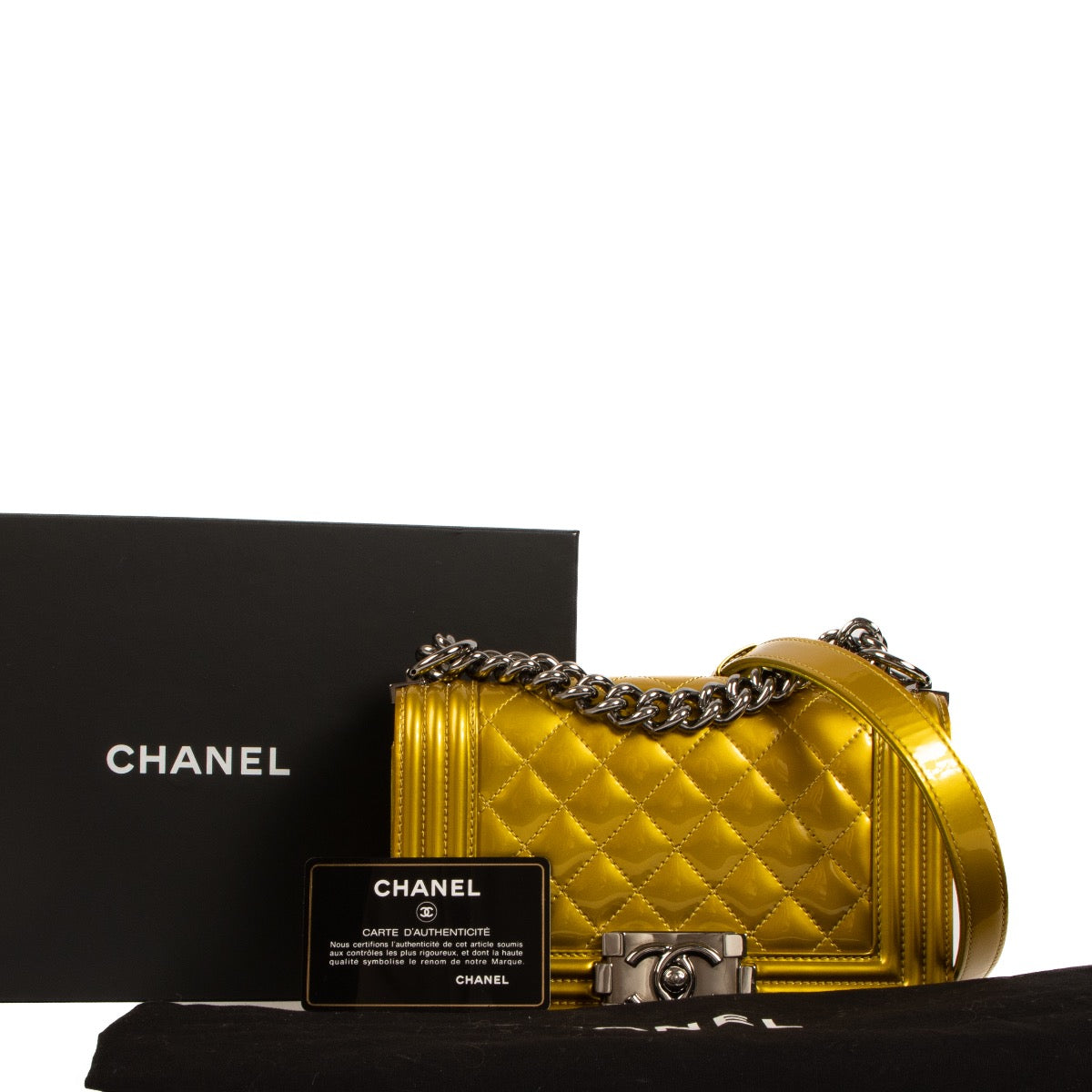 Shop safe online at Labellov in Antwerp, Brussels and Knokke this 100% authentic second hand Chanel Metallic Yellow Patent Leather Small Boy Bag