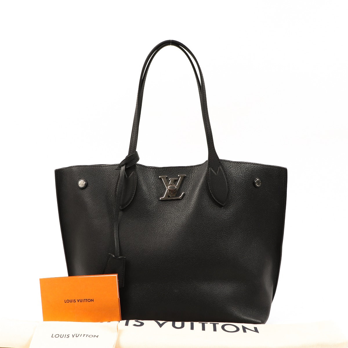 Buy an authentic second-hand Louis Vuitton Black Lockme Go Top Handle Bag in very good condition at Labellov in Antwerp.
