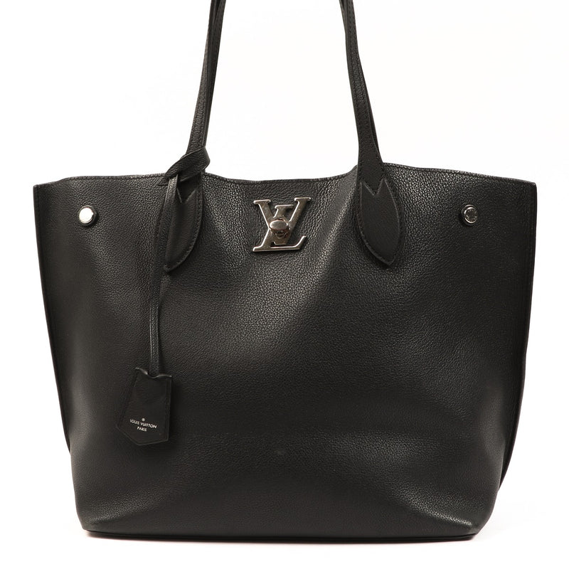 Buy an authentic second-hand Louis Vuitton Black Lockme Go Top Handle Bag in very good condition at Labellov in Antwerp.