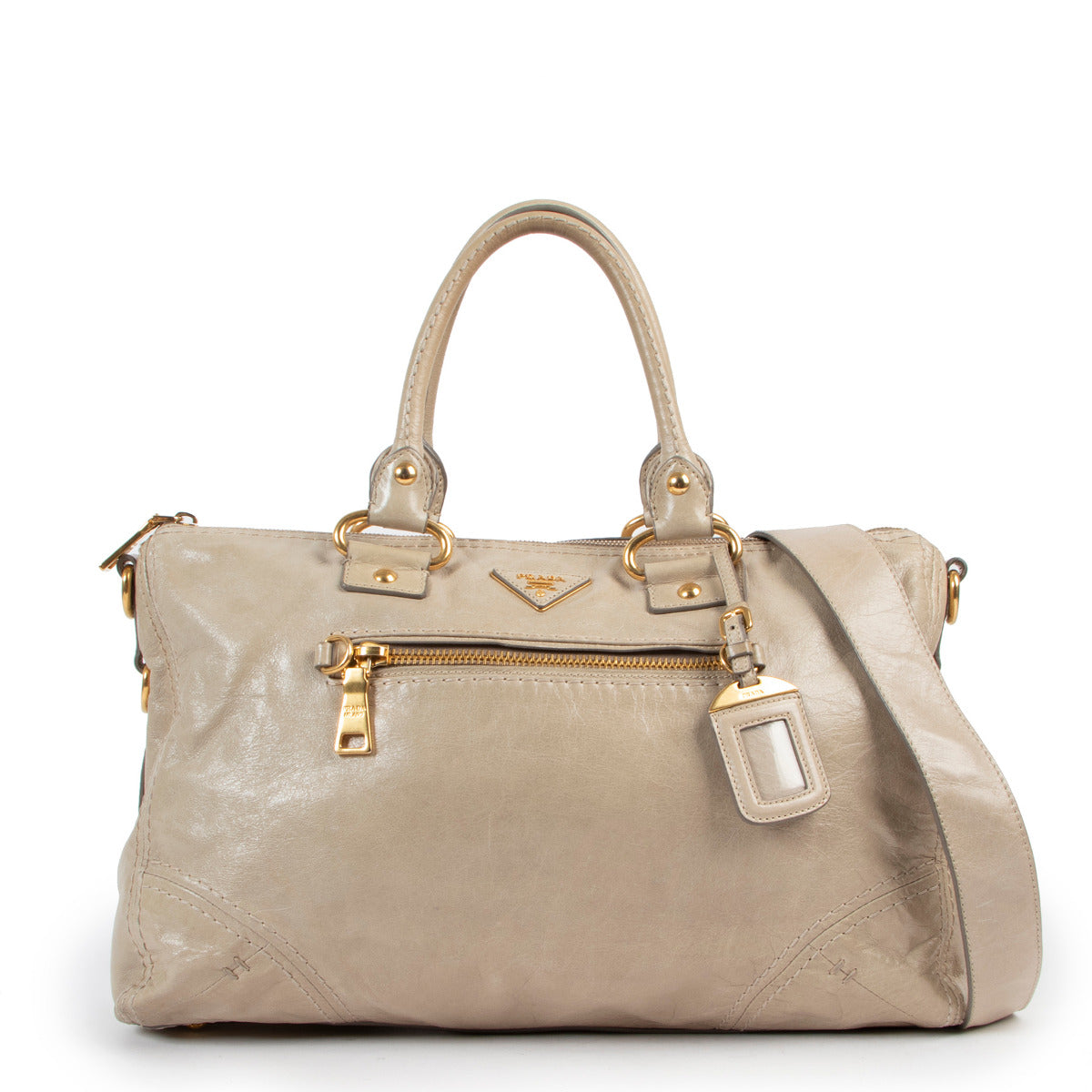 Prada beige leather handbag for the best price at Labellov secondhand luxury