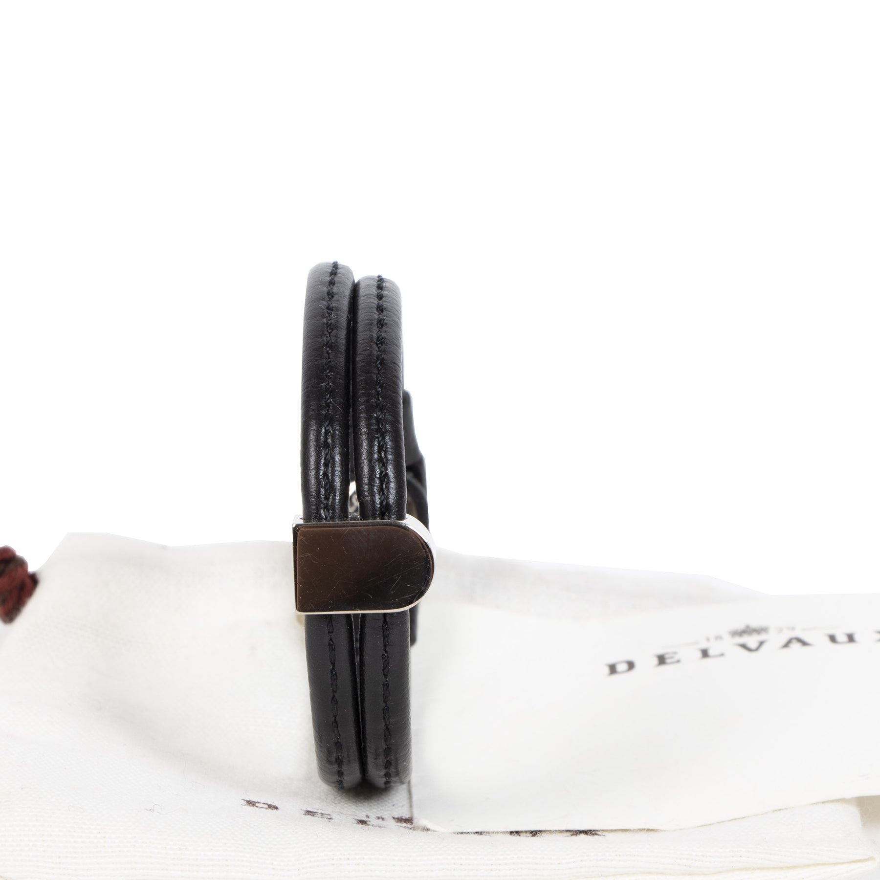 We buy and sell your authentic designer Delvaux Black Leather Bracelet Silver D at the best price