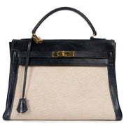Vintage designer Hermès Kelly 32 blue box calf lather with natural toile insert and gold toned hardware available for sale at Labellov secondhand luxury.