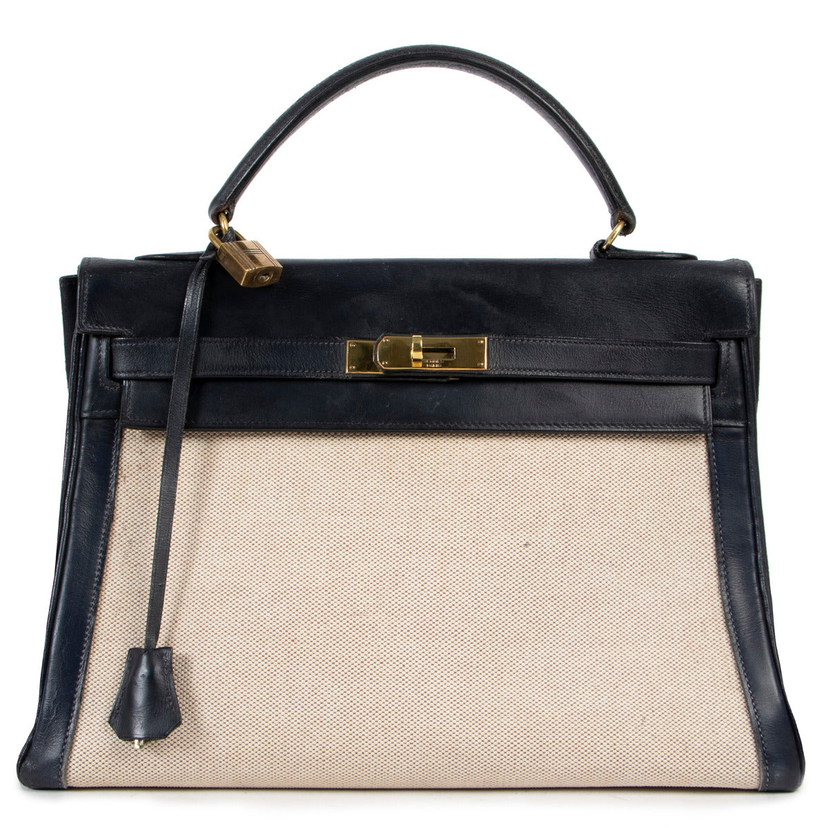 Vintage designer Hermès Kelly 32 blue box calf lather with natural toile insert and gold toned hardware available for sale at Labellov secondhand luxury.