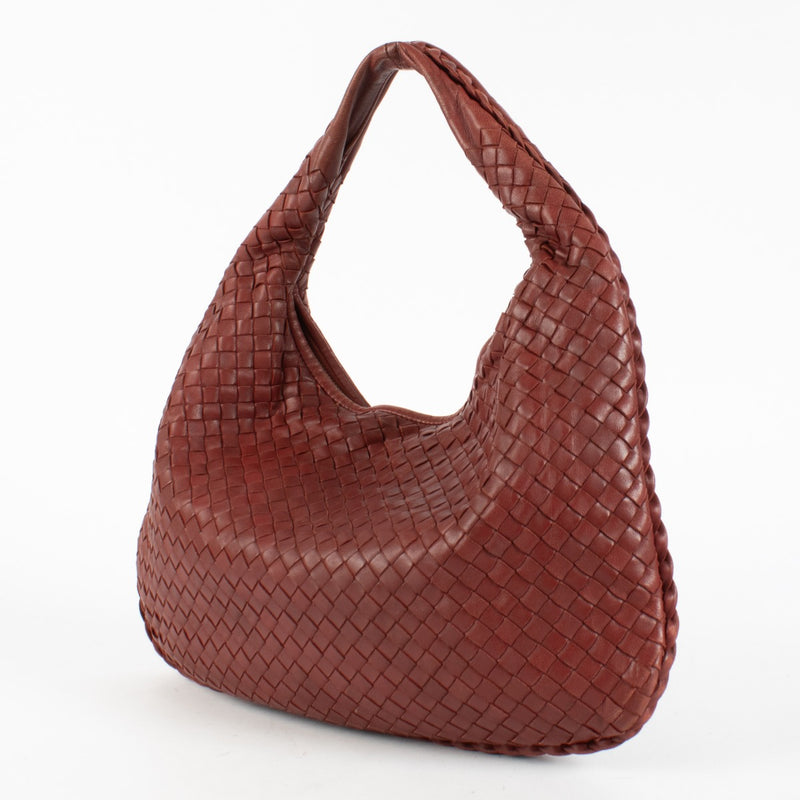 Authentic pre-loved Bottega Veneta Red Small Veneta Hobo Bag on Labellov.com