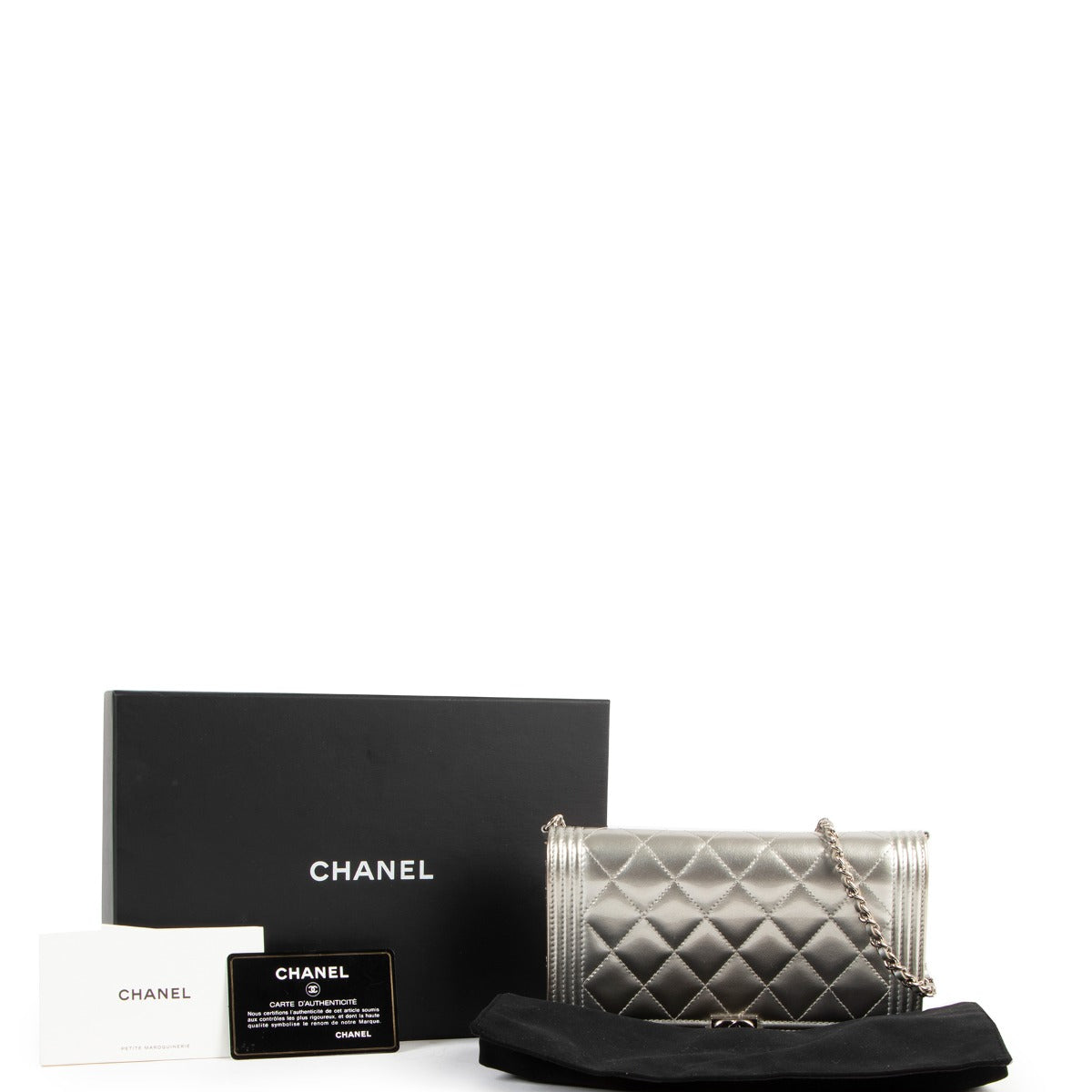 Buy an authentic second hand Chanel Silver Patent Leather Boy Wallet On Chain Shoulder Bag/ Clutch in very good condition at Labellov.