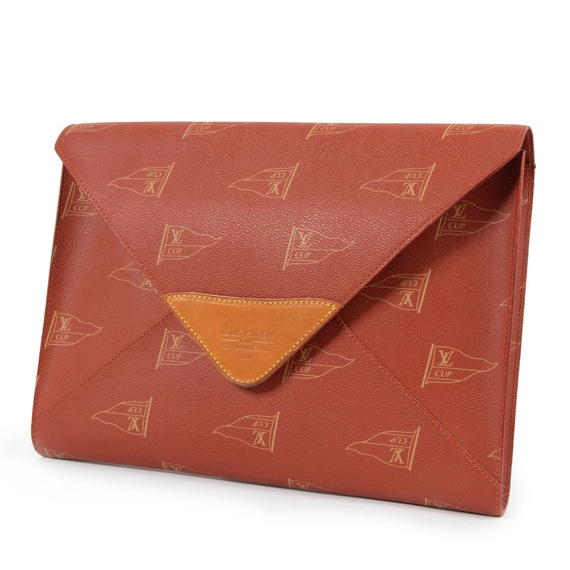 Shop safe online at Labellov in Antwerp this 100% authentic second hand Louis Vuitton Orange Canvas America's Cup Clutch