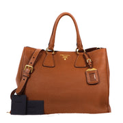 Buy an authentic second hand Prada Camel Leather Galleria Medium Top Handle bag in very good condition at Labellov Antwerp.