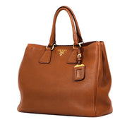 Buy an authentic second hand Prada Camel Leather Galleria Medium Top Handle bag in very good condition at Labellov Antwerp.