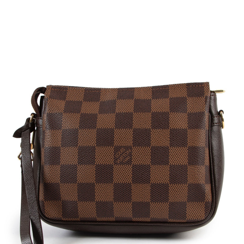 Louis Vuitton Damier Canvas Trousse Pochette Buy this gorgeous 100% authentic piece here safely!