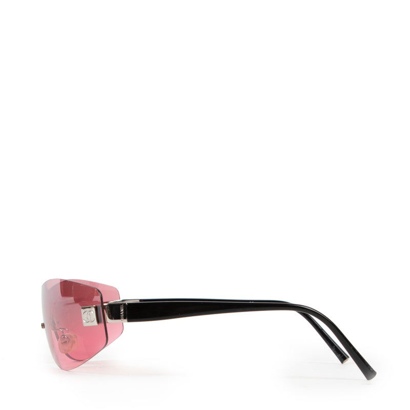 Veilig online kopen van authentieke tweedehands Chanel roze Rimless zonnebril.