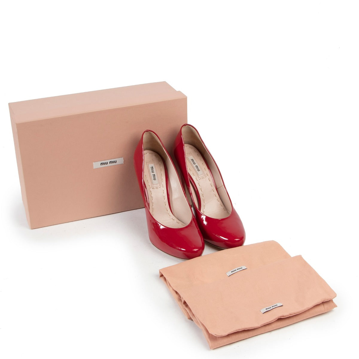 Elegant preloved vintage pumps with high heels by Miu Miu in very good state