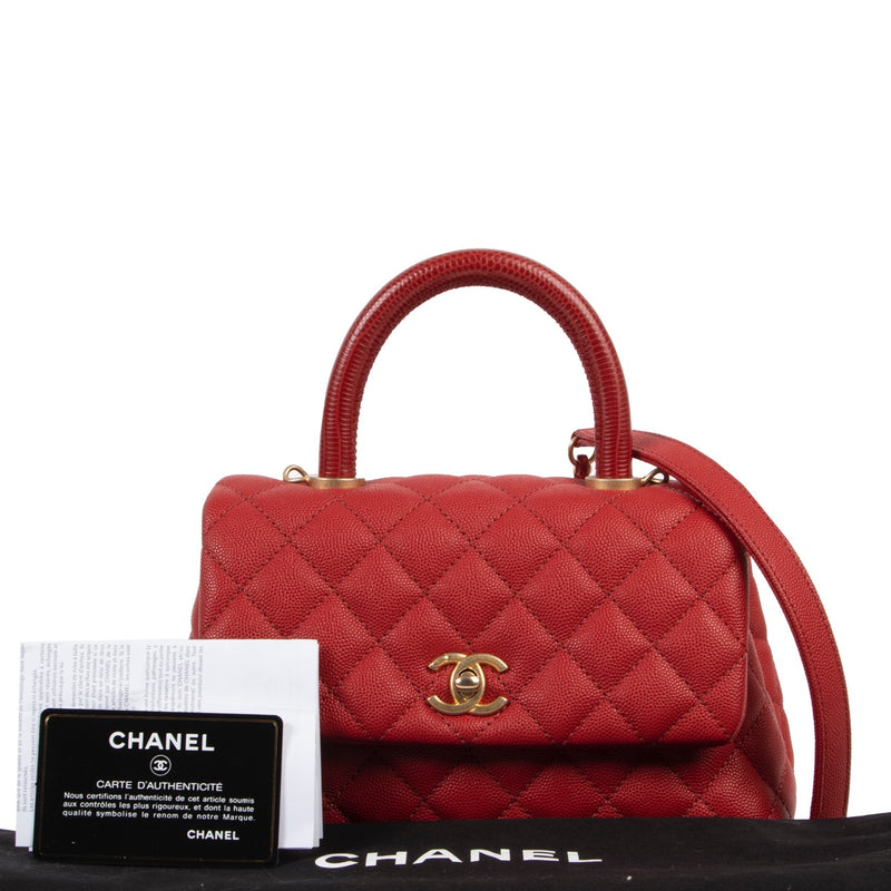 Shop safe online at Labellov in Antwerp this 100% authentic second hand Chanel Red Caviar Quilted Small Lizard Coco Handle Flap Bag