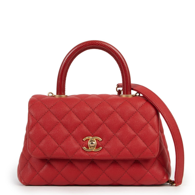 Shop safe online at Labellov in Antwerp this 100% authentic second hand Chanel Red Caviar Quilted Small Lizard Coco Handle Flap Bag