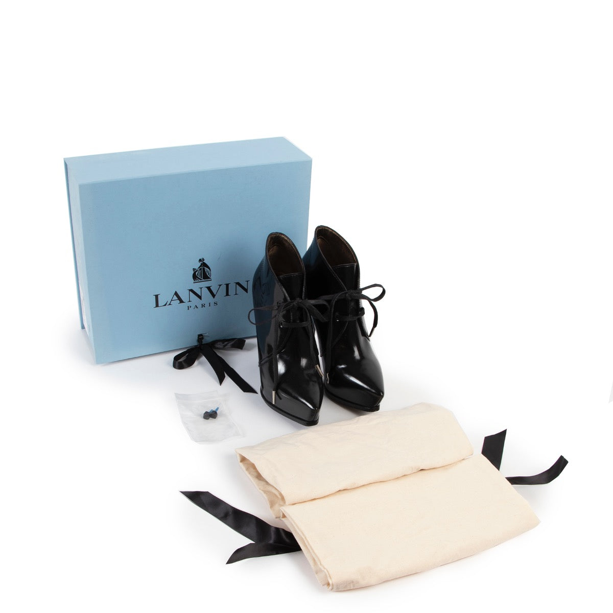 Shop safe online at Labellov in Antwerp these 100% authentic Lanvin Black Patent Leather Platform Booties - Size 36
