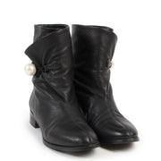 Buy authentic second hand Jimmy Choo boots with right price at LabelLOV.