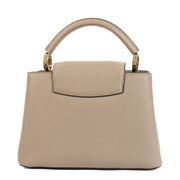 Shop safe online at Labellov in Antwerp, Brussels and Knokke this 100% authentic second hand Louis Vuitton Galet Taurillon BB Capucines. Veilig online tweedehands authentieke Louis Vuitton Galet Taurillon BB Capucines handtas kopen bij Labellov.
