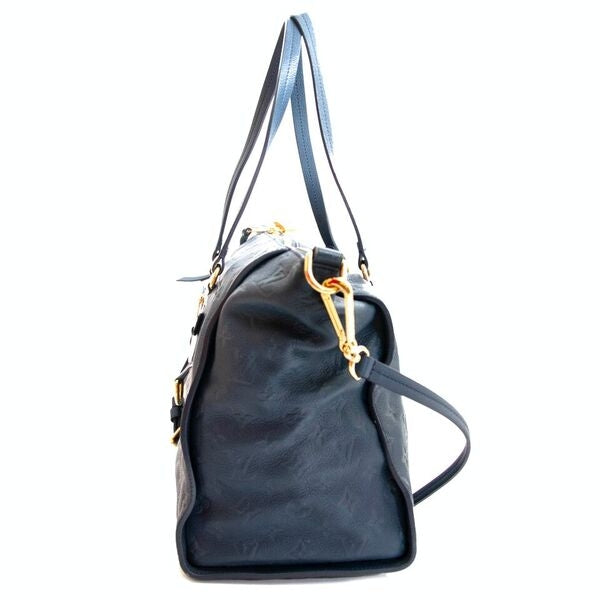 Louis Vuitton Bleu Infini Monogram Empreinte Leather Lumineuse Bag.
