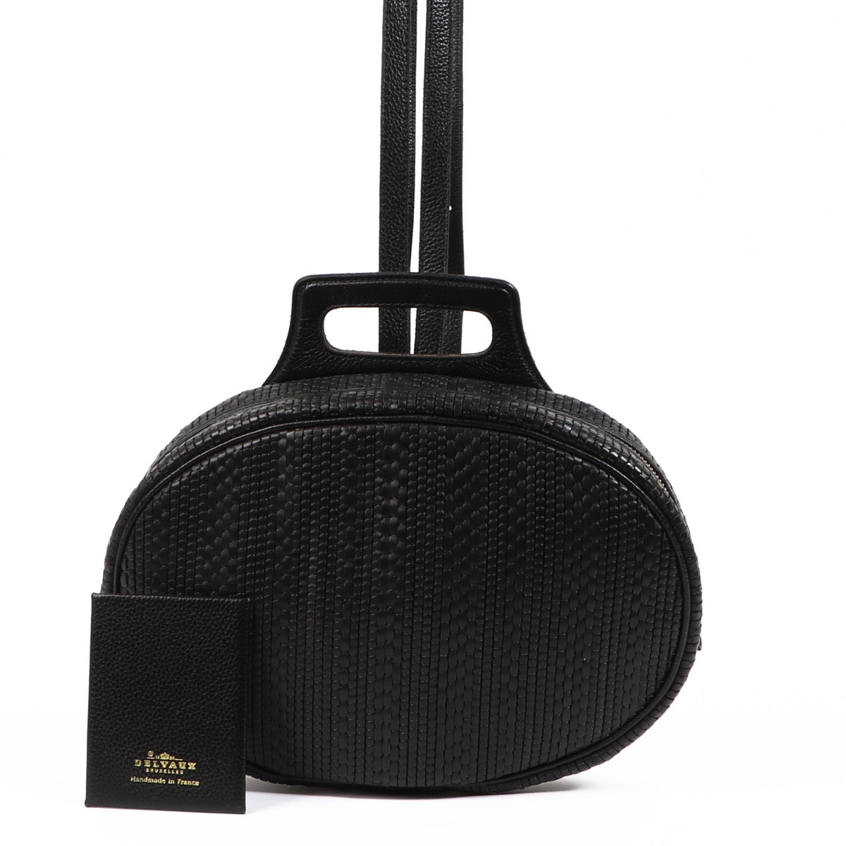 Buy an authentic second hand Delvaux Black Oval Toile De Cuir Backpack in very good condition at Labellov.com