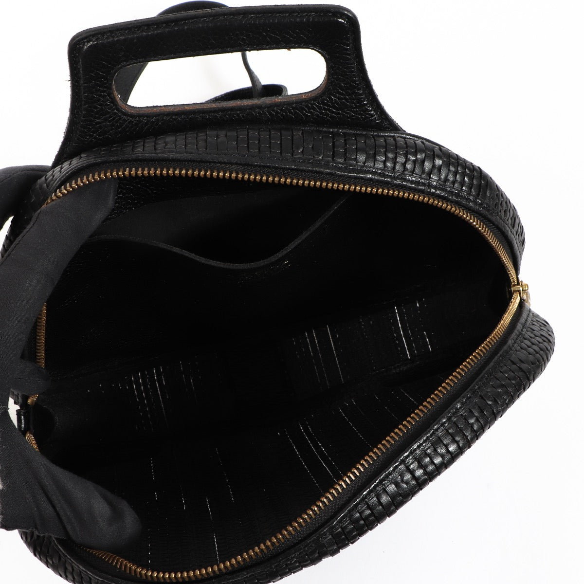 Buy an authentic second hand Delvaux Black Oval Toile De Cuir Backpack in very good condition at Labellov.com