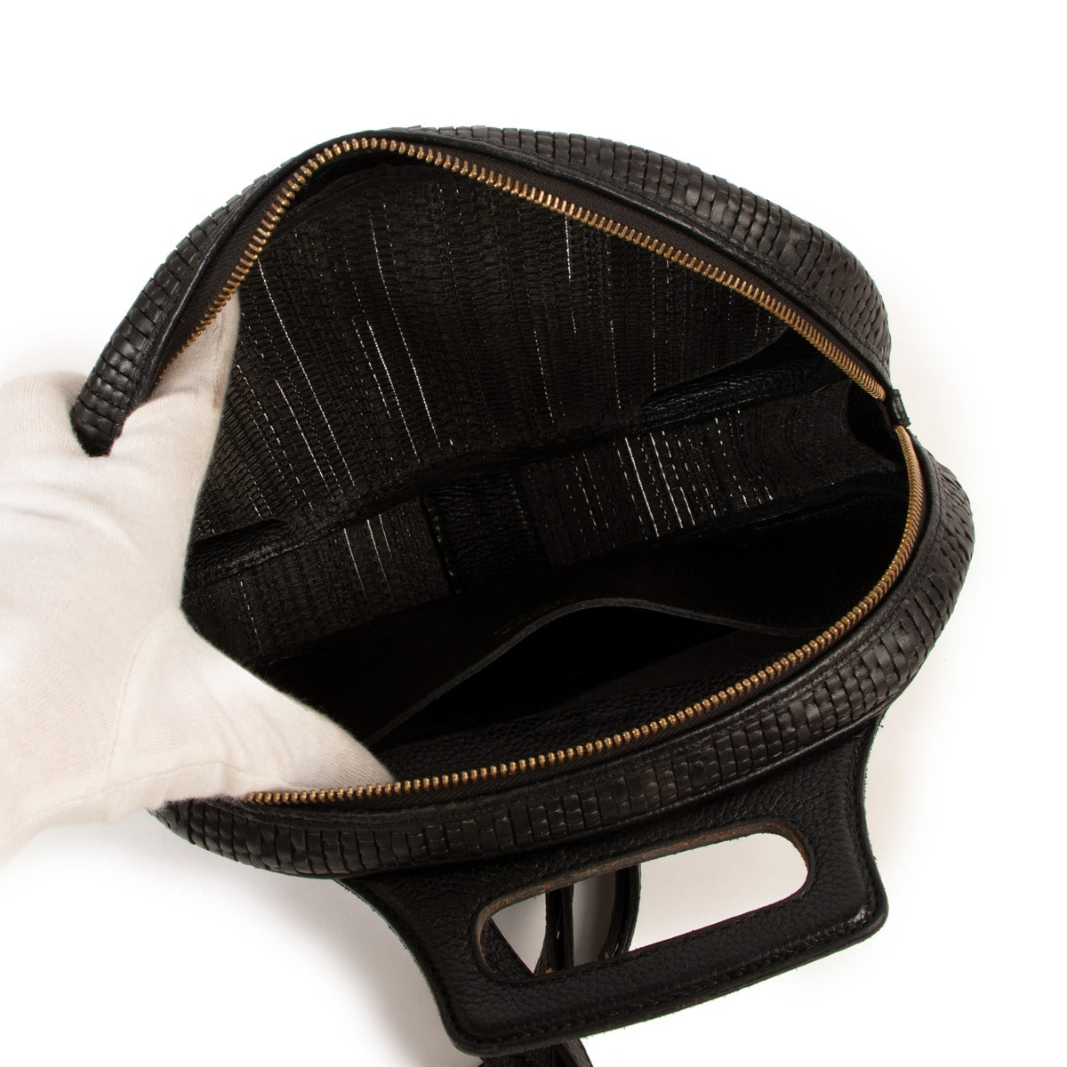 Shop authentic second hand designer vintage Delvaux Black Oval Toile De Cuir Backpack at Labellov.