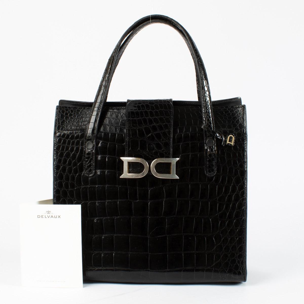 Shop safe online at Labellov in Antwerp, Brussels and Knokke this 100% authentic second hand Delvaux Black Shiny Alligator Bourgogne Tote