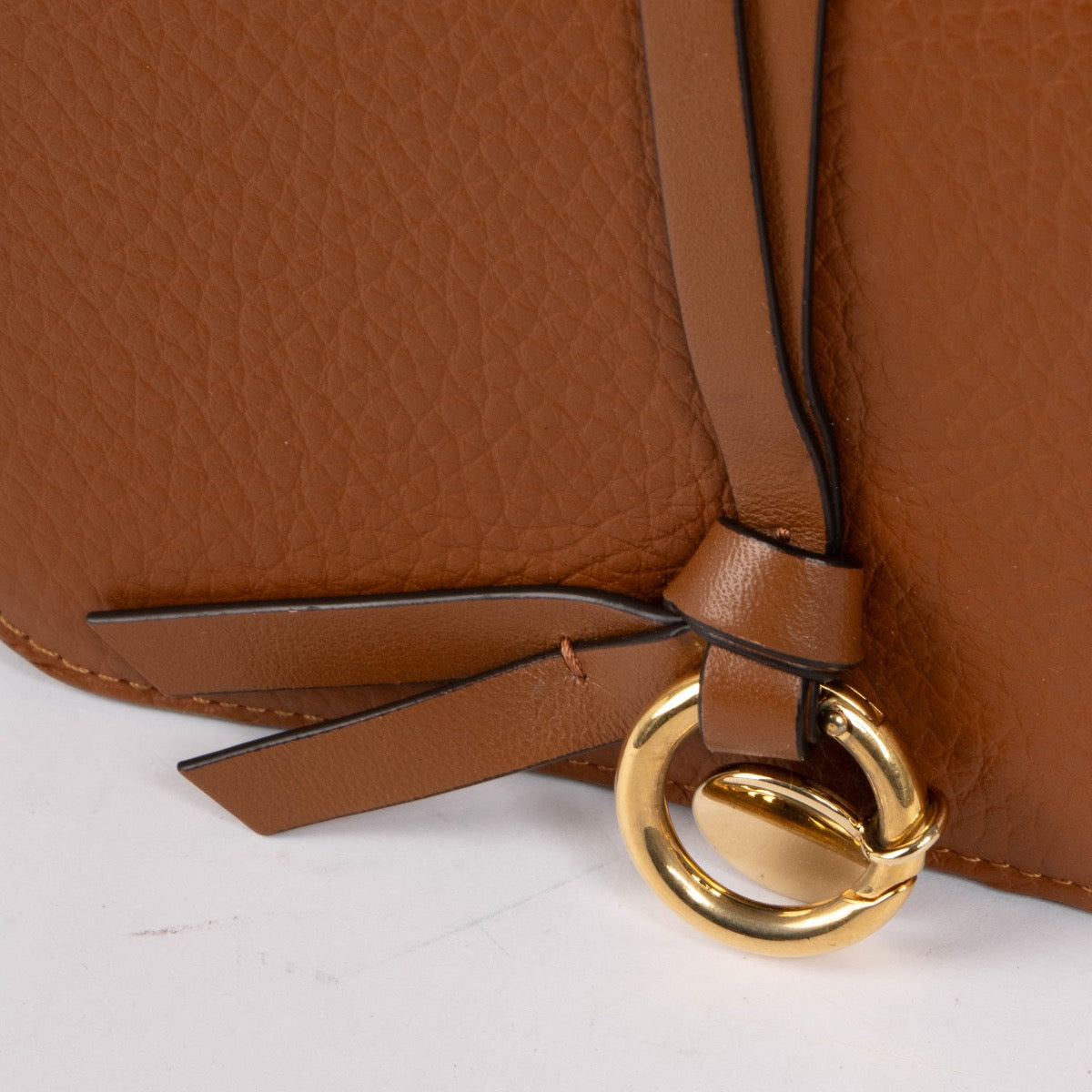 Authentic pre-loved Chloé Camel Leather Alphabet Compact Wallet on Labellov.com