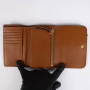 Authentic pre-loved Chloé Camel Leather Alphabet Compact Wallet on Labellov.com