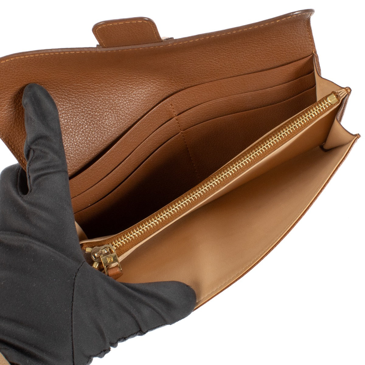 Shop 100% authentic Delvaux Brown Wallet at Labellov.com.