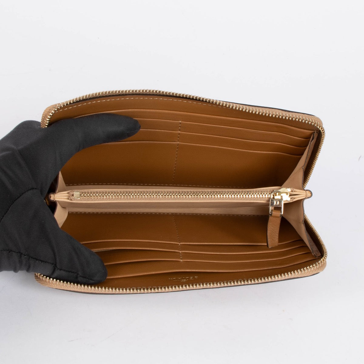 Authentic pre-loved Delvaux Vegetal Leather Polo Zip Around Long Wallet on Labellov.com
