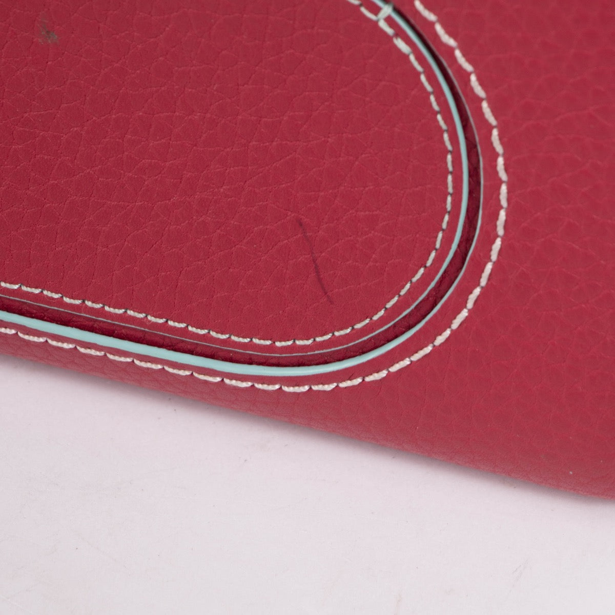 Authentic pre-loved Delvaux Framboise Taurillon Soft Daily D Wallet on Labellov.com