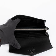 Authentic pre-loved Louis Vuitton Black Leather My Lock Long Wallet on Labellov.com