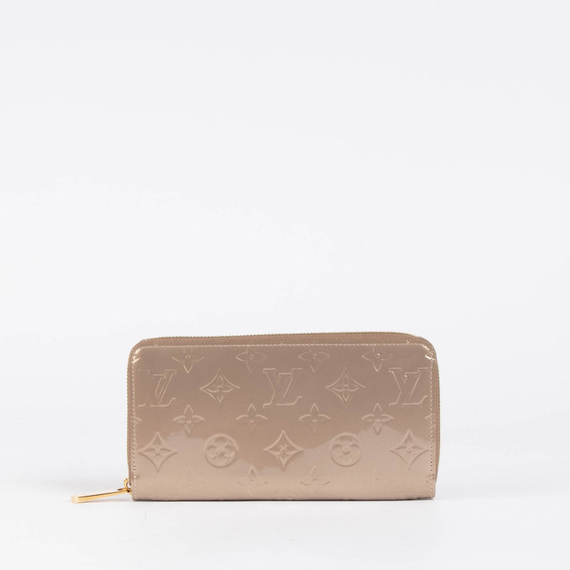 Authentic pre-loved Louis Vuitton Beige Monogram Vernis Zippy Wallet on Labellov.com