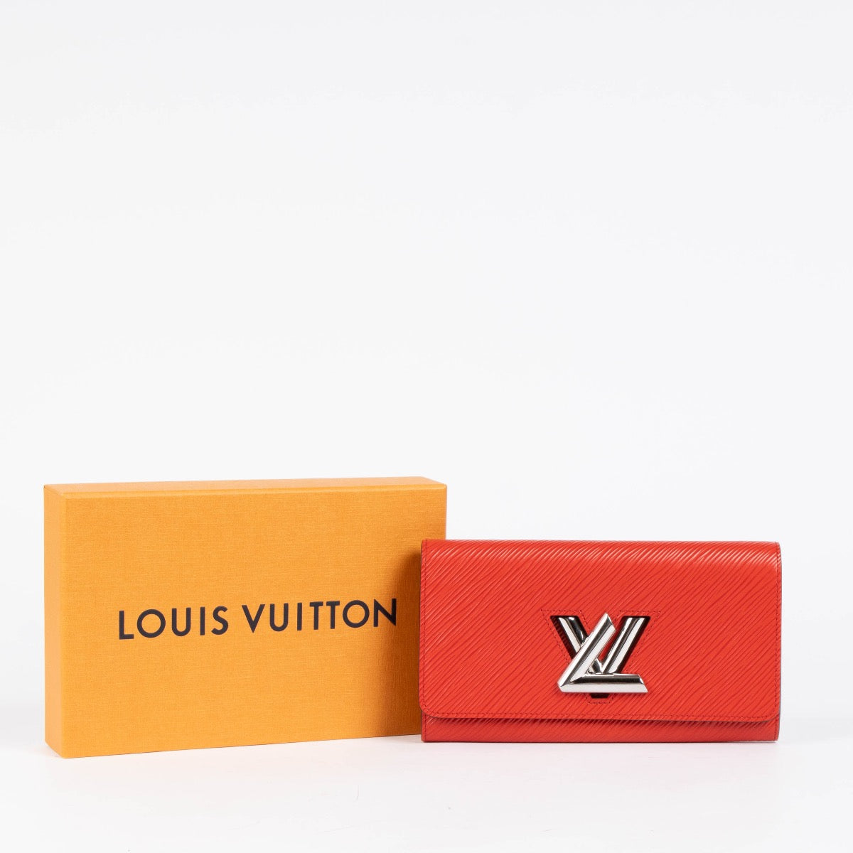 Authentic pre-loved Louis Vuitton Red Epi Leather Twist Wallet on Labellov.com
