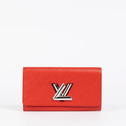 Authentic pre-loved Louis Vuitton Red Epi Leather Twist Wallet on Labellov.com