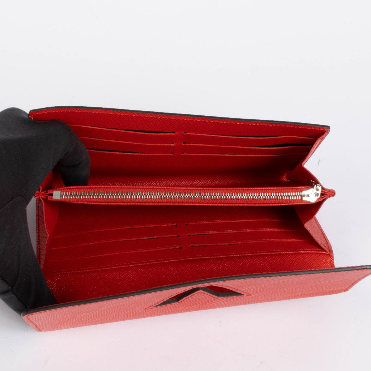 Authentic pre-loved Louis Vuitton Red Epi Leather Twist Wallet on Labellov.com