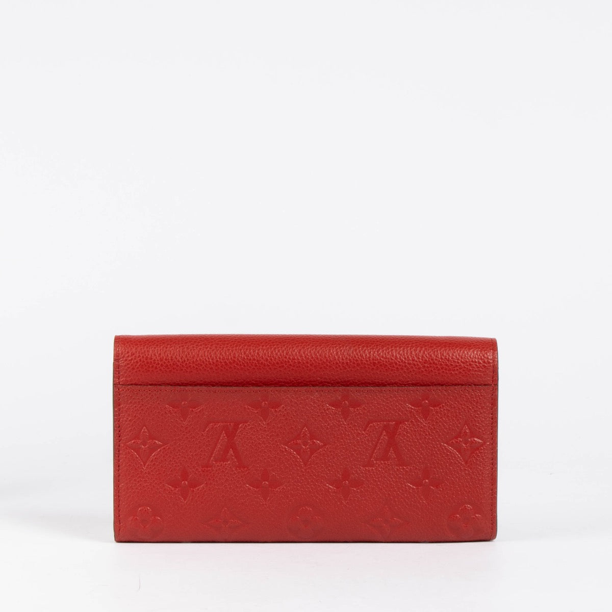 Authentic pre-loved Louis Vuitton Red Monogram Empreinte Leather Sarah Wallet on Labellov.com