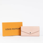 Authentic pre-loved Louis Vuitton Rose Ballarine Epi Leather Sarah Wallet on Labellov.com