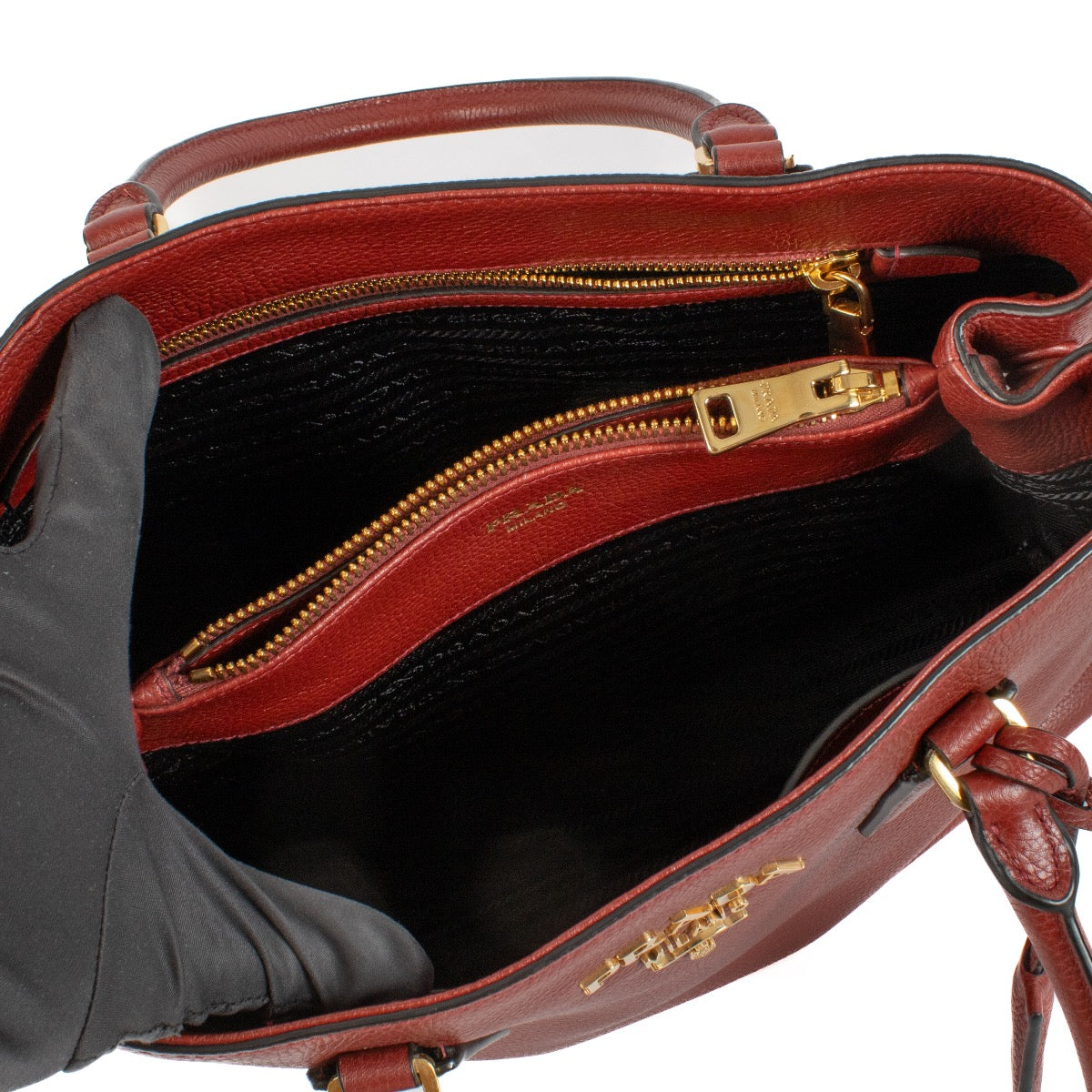 Shop 100% authentic Prada Burgundy Top Handle bag at Labellov.com.