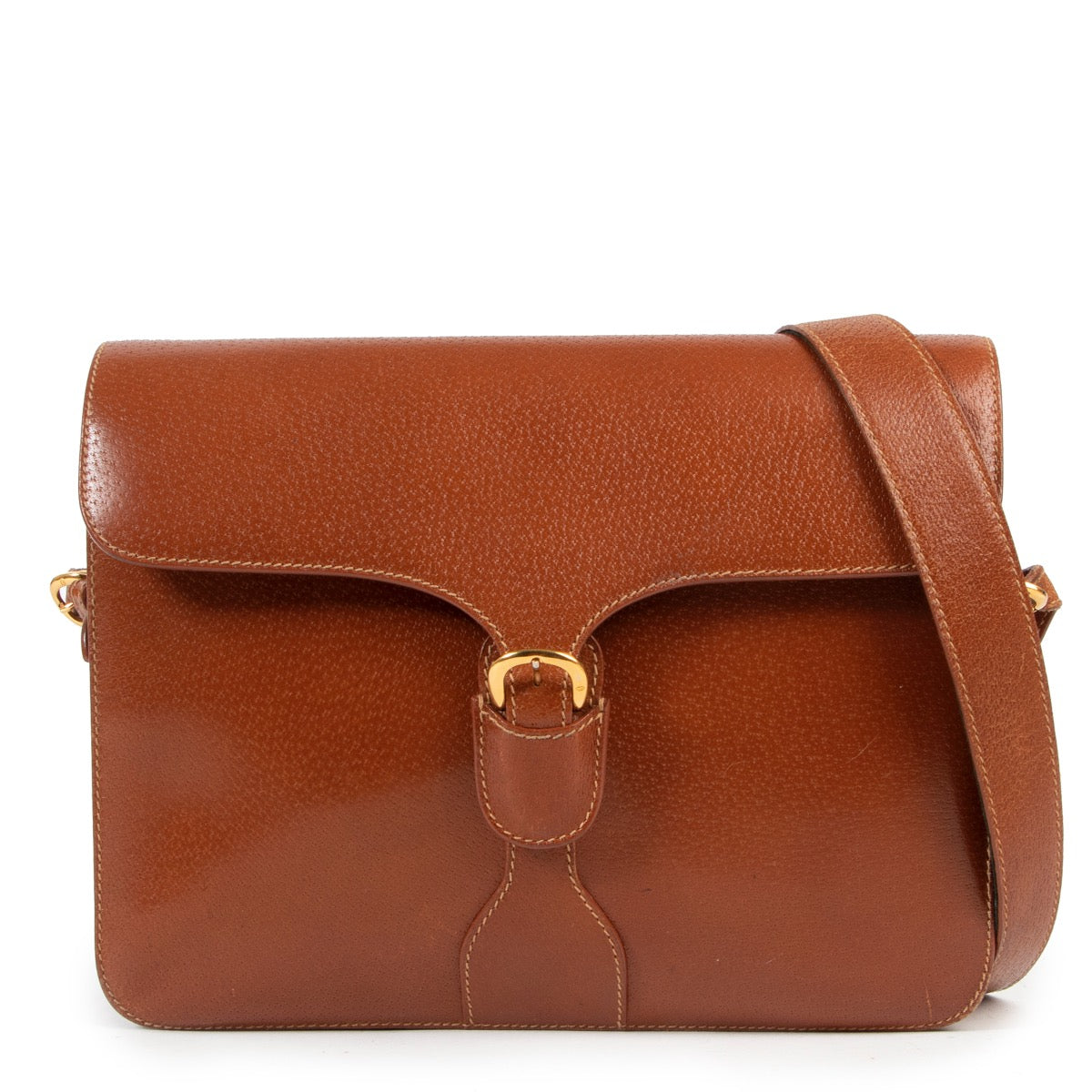 Tweedehands authentieke Gucci schouder tas in bruin leder online kopen.